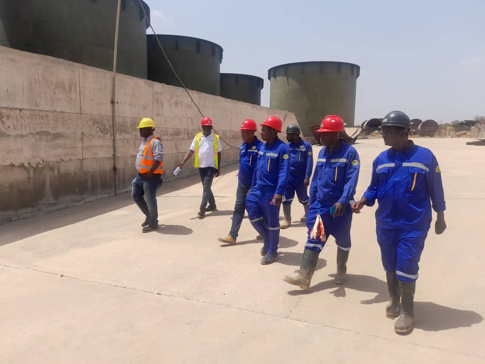 JOHN AMOANYI, DEPUTY CHIEF INSPECTOR OF MINES TAKING A TOUR AROUND OUR MINES